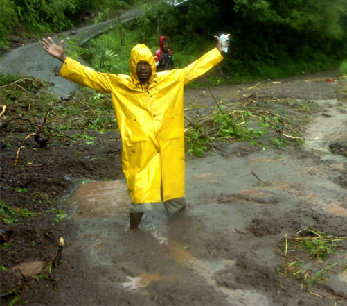 Norman Grindley
Gustav has left a trail of mud and debris in many Jamaicans parishes as this man shows while almost knee deep in saturated soil.