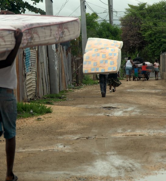 Ian Allen/Staff Photographer
Residents of Old Harbour Bay trying to move their furniture whatever way they can before the arrival of hurricane Gustav.