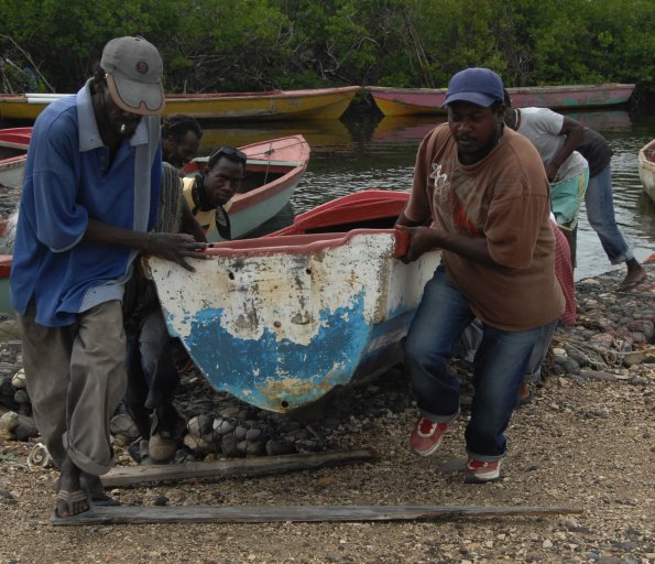 Ian Allen/Staff Photographer
Fishermen in Portland Cottage in Clarendon moving their boat to higher ground before the arrival of Hurricane Gustav.