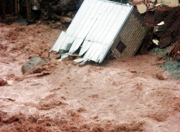 Norman Grindley
A second house is washed away by the Hope River in Kintyre, St Andrew.