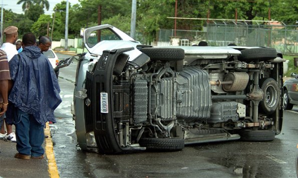 Junior Dowie / Staff Photographer
This Mini Bus overturn on Hope Rd Four Persons were in the Bus